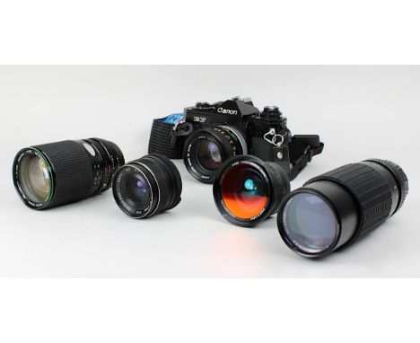 Canon EF Kamera, Nr. 318096, mit 4 Objektiven: Crystal Titanium 42x Super Wide; Hanimex HMC 1:4-5,6, 35-135 mm, Nr. 352817; T