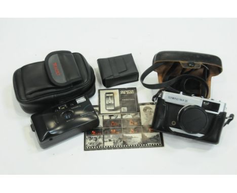 35 mm Olympus Trip camera and Yashica Micro-Elite camera