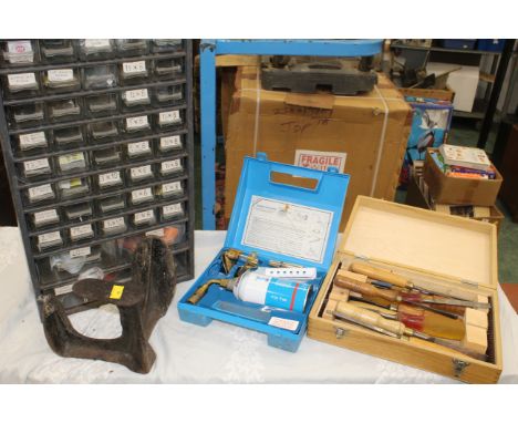 Case of chisels, cased blow lamp, screw drawers and cobblers last 