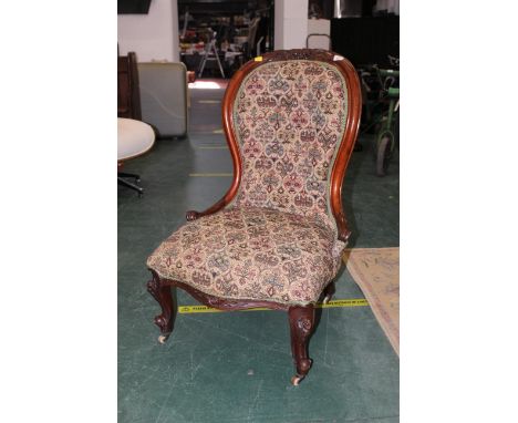 Victorian walnut ladies chair raised on cabriole legs with ceramic castors 