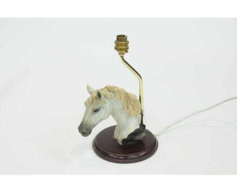 Table lamp with horse head decorated base 