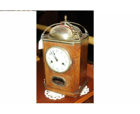 Oak cased bracket clock with silver plated bell, key and pendulum, overall height including finial +/- 37 cm