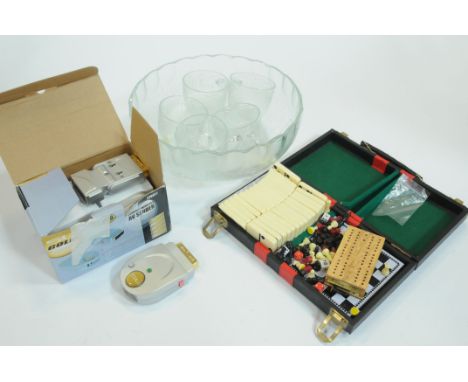 Games set, to include dominoes, chess, etc., punch bowl and cups and an AV sender 