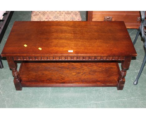 Oak coffee table with low shelf 