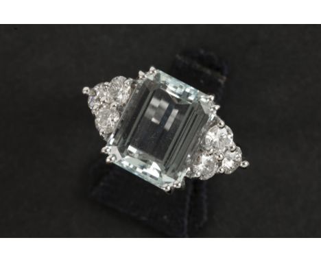 ring in white gold (18 carat) with a ca 6,50 carat aquamarine with nice color and transparency and ca 1,20 carat of very high
