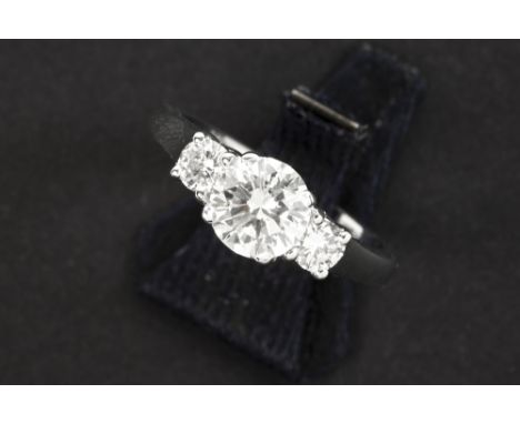 a 1,20 carat natural fancy light yellow high quality brilliant cut diamond set in a ring-white gold (18 carat) with 0,40 cara