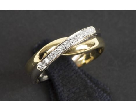 ring in yellow and white gold (18 carat) with ca 0,10 carat of high quality brilliant cut diamonds || Soort dubbele alliance 