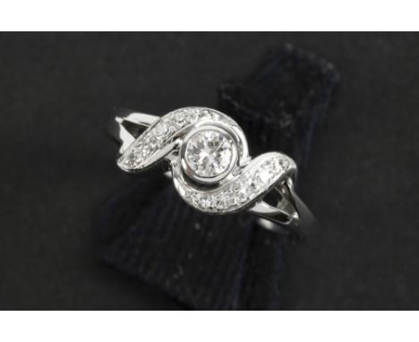 ring in white gold (18 carat) with at least 0,25 carat of very high quality brilliant cut diamonds || Ring in witgoud (18 kar