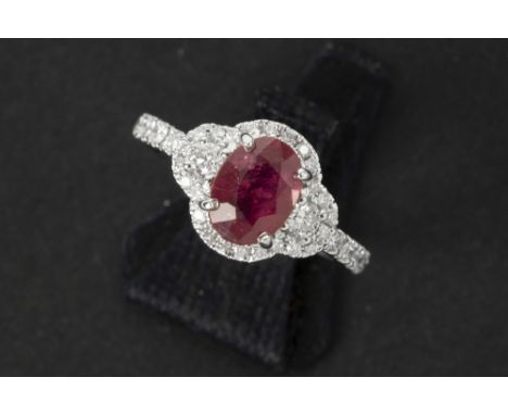 ring in white gold (18 carat) with a ca 1,40 carat Burmese ruby and ca 0,60 carat of very high quality brilliant cut diamonds