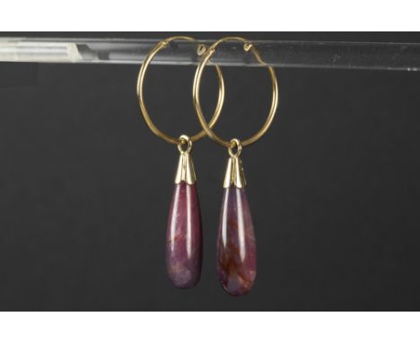 pair of earrings with Creole model in yellow gold (18 carat) and each with a removable pendant with a drop-shaped cut ruby (c