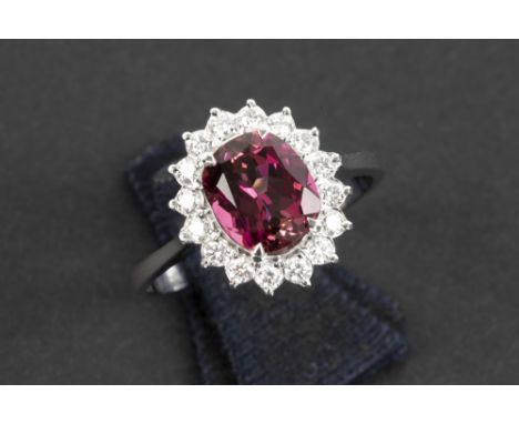 ring in white gold (18 carat) with a 1,86 carat tourmaline with nice natural pink color surrounded by 0,33 carat of very high