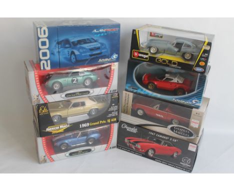 A COLLECTION OF EIGHT VARIOUS BOXED 1:18 SCALE DIECAST VEHICLES, to include Solido Alain Prost collection Toyota Corolla trop