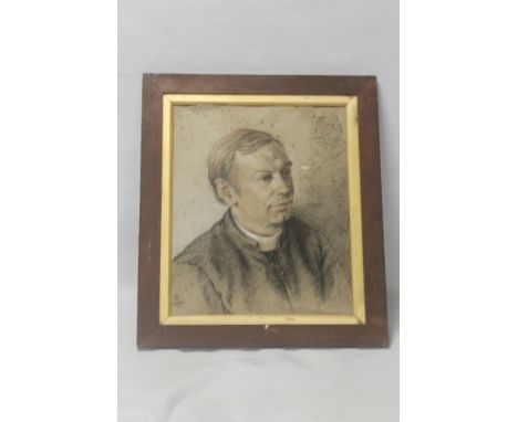 A FRAMED PASTEL PORTRAIT OF A CLERGYMAN with monogram signature