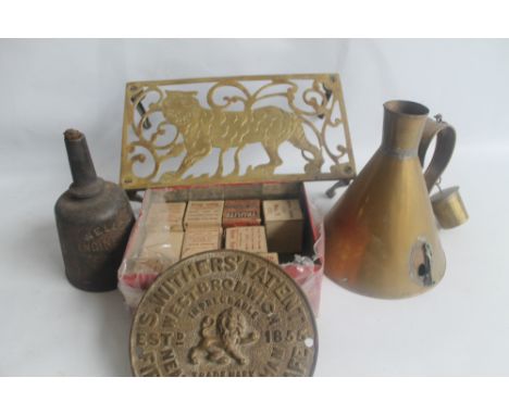 AN S. WITHERS' BRASS SAFE PLATE, A BRASS 'TIGER' TRIVET, A PORTABLE WELLS ENGINEER OIL LAMP NO.4A, a copper lidded jug A/F, a
