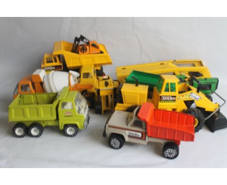 A COLLECTION OF LARGE SCALE METAL TONKA TOYS, to include vehicle transporter trucks, cement  mixer, dump truck, tractor and t