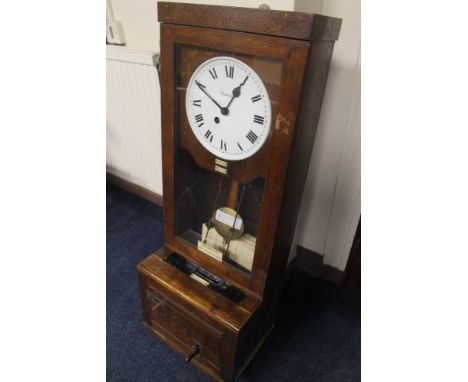 AN EARLY 20TH CENTURY OAK CASED "SIMPLEX" TIME RECORDER CLOCK with keys, H 115 cm