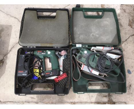 A BOSCH BELT SANDER IN A CASE AND A BOSCH PBM 7-2V-1 CORDLESS DRILL IN CASE WITH BATTERY AND CHARGER IN WORKING ORDER 