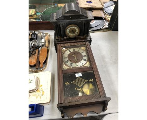 A WOODEN WALL CLOCK WITH GLASS WINDOW AND MANTLE CLOCK 