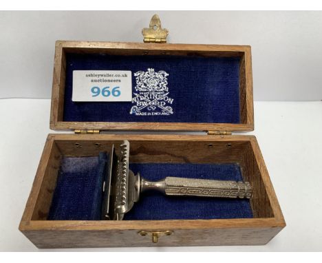A BOXED WHITE METAL WILKINSON SWORD RAZOR 