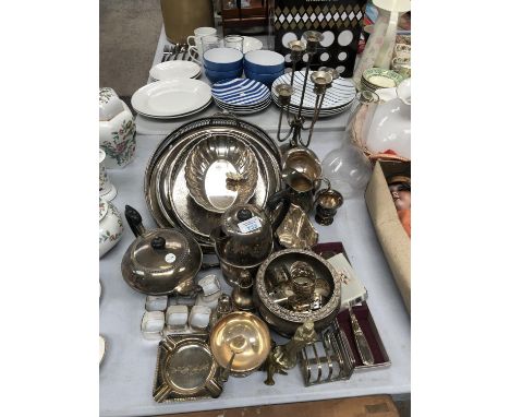 A COLLECTION OF EPNS AND METAL ITEMS TO INCLUDE CANDLE STICK, TRAYS ETC 