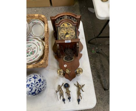 A 'WARMINK' CHIMING MOON FACE WALL CLOCK 