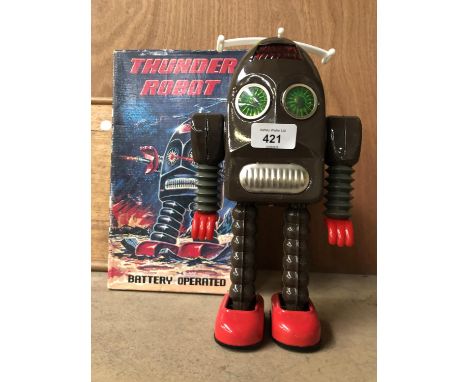 A VINTAGE BOXED 'THUNDER ROBOT' BATTERY OPERATED MODEL 