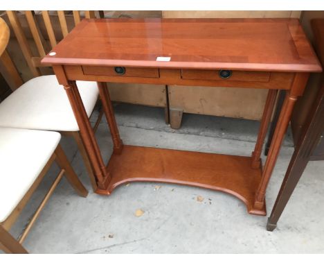 A MAHOGANY HALL TABLE WITH TWO DRAWERS AND LOWER SHELF 