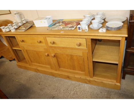 A large light oak sideboard 