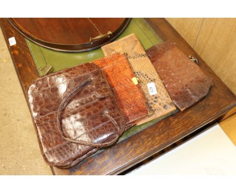 Four vintage crocodile handbags 