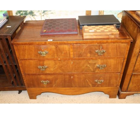 A 19th Century mahogany and cross banded chest of two short and two long drawers