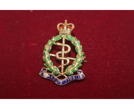 A 9ct gold and enamel decorated brooch, total weight 4.5gms 