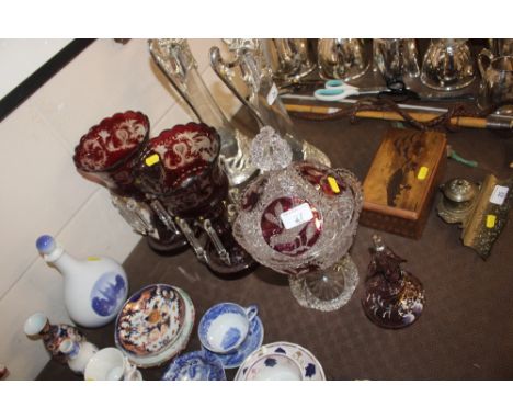 A pair of ruby glass lustre vases AF; a ruby decorated bowl and cover; and an enamel decorated amethyst glass jug