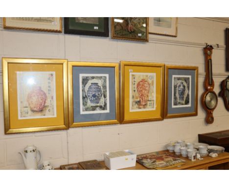 Four coloured prints of Chinese vases