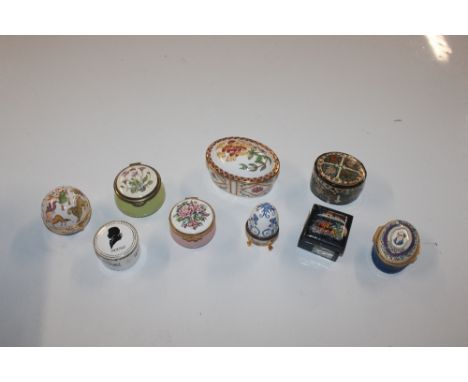 A box containing various Halcyon Days enamel boxes and others 