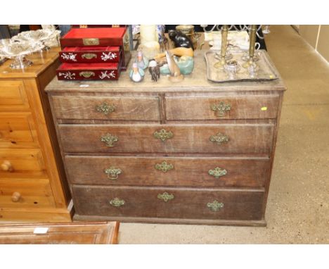 A Georgian oak chest of two short and three long drawers 