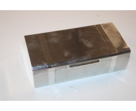 A silver and engine turned decorated box 