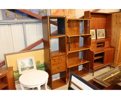 A modern mahogany wall shelf unit fitted three drawers 