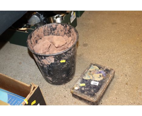 A vintage metal bucket and contents of artists clay; and a metal ware paint box and contents of artists tools 