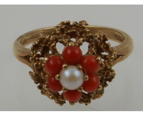 A 9ct gold, coral and pearl floral cluster ring.