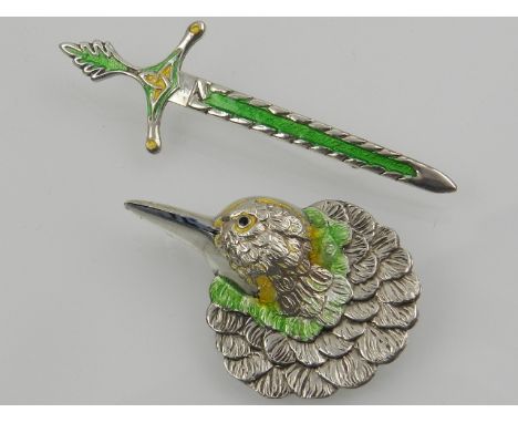 A Scottish silver and enamel sword brooch, Birmingham 1920, together with a silver and enameled brooch in the form of a hummi