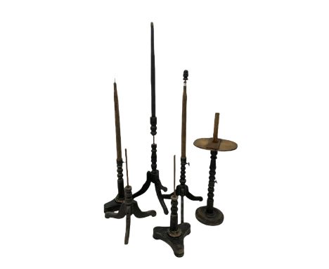 Collection of mid 19th century ebonised mannequin stands of various size