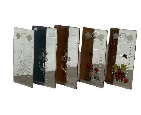 Two pairs of vintage mid century frameless bevel edge mirrors with floral decoration, together with another similar mirror, 