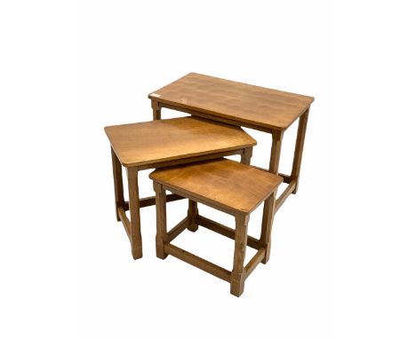 Robert 'Mouseman' Thompson of Kilburn - Yorkshire oak nest of three tables, each with an adzed rectangular top raised on octa