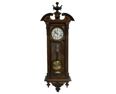 A mid-nineteenth century eight-day Vienna Regulator in a light mahogany case with ebonised mouldings and highlighted detail, 