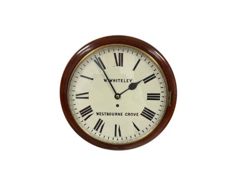 A mid-19th century wall clock with a&nbsp;15" wooden bezel and 12" painted white dial with Roman numerals and minute track, s