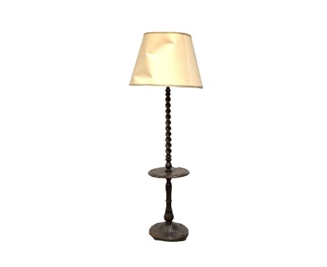 Early 20th century oak lamp standard, spiral turned column with turned candle stand, raised on a circular acanthus leaf carve