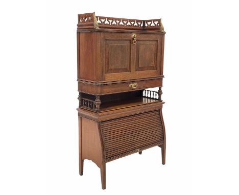 Early 20th century mahogany bureau, the raised and pierced top with brass mounts over two panel fall front with fitted interi