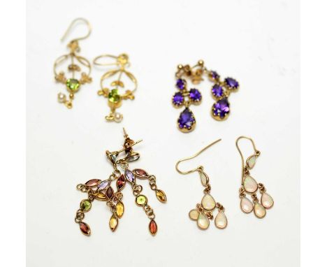 A selection of gemstone set drop earrings including: a pair of amethyst chandelier earrings; a pair of peridot and seed pearl