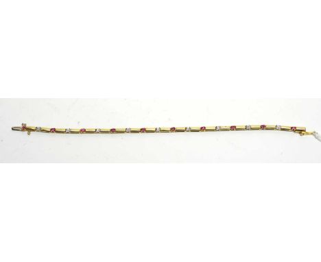 A ruby and diamond bracelet, each of the 9ct yellow gold baton links alternately set with single diamond or ruby, 18cms long,