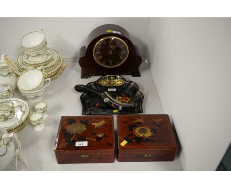 Smiths mahogany mantel clock, in domed case, 23cms high; along with a ebonised, painted wood brush and shovel; and a pair of 